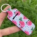 Porte-clés étui à rouge à lèvres avec motif floral blanc et rouge en tissu durable - Rose