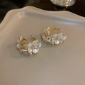 Detailed close-up of golden C-shaped hoop earrings with white 3D flowers and crystals - White Stereo Stacked Flower (3 Silver Earring Posts. White)