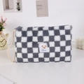 Detail of plush checkerboard makeup bag with cute bear label and side woven handle - Checkered Grey