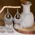Detailed close-up of retro silver tassel earrings with delicate bohemian leaf motifs - E2874-14/Leaf Feather Pendant