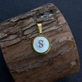 Golden round pendant with letter S engraving and white mother of pearl inlay - Letter S / 17x20mm
