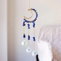 Detail of moon suncatcher with blue stones and dangling clear crystal prism balls - Lapis Lazuli