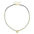 Close-up of beaded necklace with grey beads, gold spacers and a textured coin pendant - Bronze Green