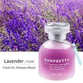 Close-up of 65ml lavender liquid car air freshener with a purple frosted glass bottle - 65ml / Lavender