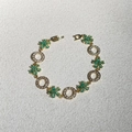 Exquisites vergoldetes Armband mit grünen Zirkonia-Blüten und kristallbesetzten Ringen - Gold Blau Blume