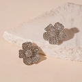Close-up of silver flower stud earrings with sparkling white crystals on stone - Silver Rhinestone Flower (925 Sterling Silver Earring Post)