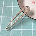 Detail view of marble pattern U-shaped hair pin measuring 11.7cm on green cloth - 13# (Thin) Green U-Shaped Acetate Hair Fork