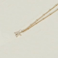 Golden letter K pendant necklace with small white pearls on a minimalist beaded chain - Letter K