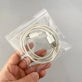 White USB-A to USB-C charging cable in a transparent self-sealing plastic jewelry bag - 30 Micron 12x12cm Resealable / 100 Pcs/Pack