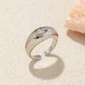 Close-up of polished silver ring with cubic zirconia inlay and adjustable open band - Adjustable Open / Silver Zirconia Dome