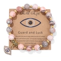 Pink marble bead bracelet with gold evil eye charm on gift display card - 19cm / Pink Zebra Jasper