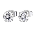 Detailed macro view of classic four-prong silver stud earrings with round cubic zirconia - Style D-4-Claw Round / Steel