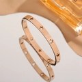 Bracciale rigido in acciaio inossidabile oro rosa 18k con motivi a stelle vuote - Oro Rosa Cavo Stella