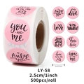 Detail view of 1-inch pink Valentine stickers showing 8 romantic designs and roll specifications - Ly-58; 2.5cm/1inch * 500 Patches
