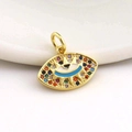 Macro detail of 18k gold plated evil eye pendant with multi-color zircon inlay - 11-Evil Eye With Multicolored Gems