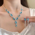 Hemelsblauwe kristallen sieradenset met V-vormige ketting en kwastjes oorbellen - 2-delige ketting- en oorbellen set / Blauw