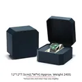 Dark green octagonal PU leather watch box with cream interior in open and closed views - Octagonal / Dark Blue