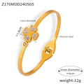 Gold plated titanium steel bangle featuring a clover pendant and sparkling crystals - Z170 - Gold Bracelet
