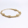 Modieuze vergulde titanium stalen armband met vier holle dierenpoot hangers voor dames - Goud (KB118508-KHY)
