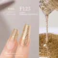 Vernis à ongles pailleté or champagne F125 avec texture végétale solide et dégradée - F125 Paillettes Champagne Denses