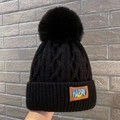 Black cable knit beanie with a faux fur pompom and happy label for winter warmth - Happy-Thickened Style / Black