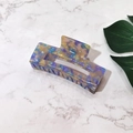 Close-up of a large square hollow hair claw with colorful marble acetate texture - 10cm / Purple Floral (Large)
