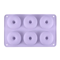 6-cavity purple silicone donut mold for baking cakes and cookies on white background - Purple