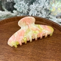 Pink and cream marble acetate hair claw clip with golden lettering on wooden tray - Pink Green Marble - 8 Teeth (11cm)