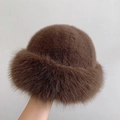 Thick chocolate brown faux fur bucket hat with soft plush texture for winter warmth - Coffee