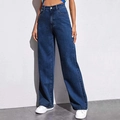 Donkerblauwe high-waisted jeans met wijde pijpen op een model met een strakke achtergrond - S / Donkerblauw
