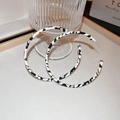 Elegant gold earrings with black and white woven texture displayed on a light tray - 90# Silver Needle-Black White (Circle)