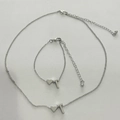 Parure de bijoux argentée avec pendentif en forme de cœur et lettre T sur collier et bracelet - Lettre T Style (2786) / Argent