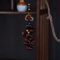 Red sandalwood persimmon peanut keychain with a colorful handmade Chinese knot - Sandalwood Persimmon Perfection Small