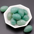 Polished green agate egg-shaped gemstones displayed in a white hexagonal ceramic plate - Green Aventurine (1pc)