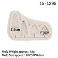White silicone leaf mold for fondant featuring four diverse botanical leaf designs - Gray