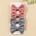 Set of four waffle texture hair bows in pink and grey colors on white display card - Pink/Grey (Set of 4)