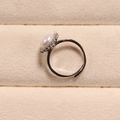 Elegant adjustable ring featuring a lustrous white pearl and sparkling zircon halo - Ring