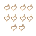 Close-up of ten gold heart-shaped pendants with rhinestones and double loops for jewelry - 5# Rhinestone Double Ring Heart