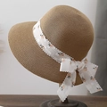 Brown straw sun hat for women with floral lace ribbon and a large bow tie decoration - Khaki