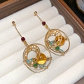 Detailed close-up of vintage crystal round stud earrings with gold alloy and colorful beads - Gold / Gold