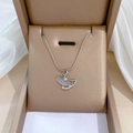 Close-up of a silver ginkgo leaf pendant necklace in a luxury jewelry gift box - Ginkgo Leaf Pendant Snake Chain Silver (N217)