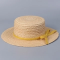 Detail of the flat top straw boater hat featuring a vibrant yellow woven ribbon bow - M(56-58cm) / Yellow