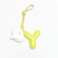 Detailed view of handmade leather heart and yellow letter Y bag charm with stitching - Light Yellow with Off-white Heart