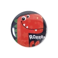 Round tinplate badge featuring a red cartoon dinosaur with stars and ROARRRR text - One Size