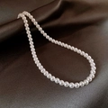 Collana classica a filo singolo di perle bianche lucide su uno sfondo di seta pregiata - 38# Collana-Bianco 6mm
