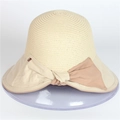 Elegant beige sun hat with large decorative bow for sun protection - Adjustable / Beige