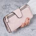 Women's long clutch wallet in soft pink faux suede with secure snap closure - Pink