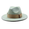 Detail of mint green wool fedora with khaki satin ribbon and golden bee brooch - Mint Green