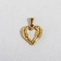 Detail of a 24K gold plated stainless steel heart pendant with textured surface - K17-Winged Heart / Gold