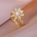 Elegant gold flower ring with pearl center and pavé diamonds on pink silk fabric - Gold Rotating Pearl Flower Style (J0275-金色旋转花-1) / Gold